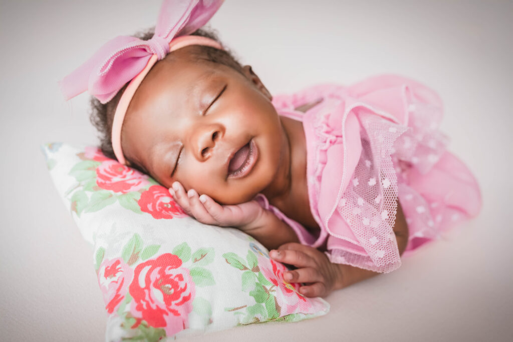 pink baby girl on the pillow